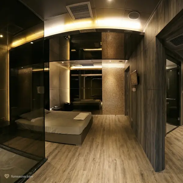 Glass wall bedroom at Number One Sauna, Macau