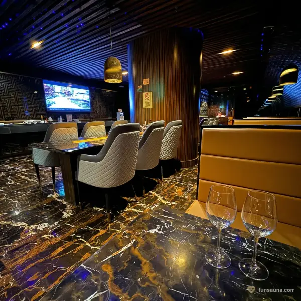 Marble dining area at The Excellent Sauna, Macau