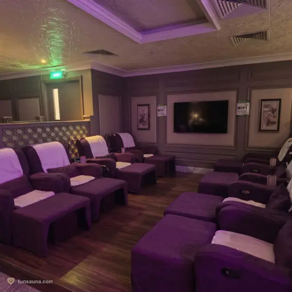 Row of massage chairs in Victoria Sauna's rest lounge, Macau